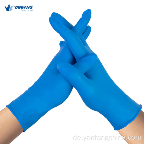 Angetriebene freie blaue medizinische Nitrilhandschuhe